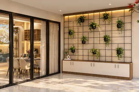 Garden wall, Gulmohar House. Planters hung on a steel grid above a long cabinet edged in oak.