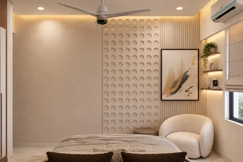 Guest room, Gulmohar House. A wall of carved circles beside fluted panels, a bouclé armchair, and floating shelves.