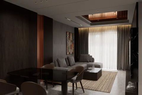 Dining, Smoke & Copper. The glass-topped table on its dark pedestal, with the living room past the copper reveal.